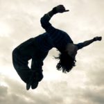 Man performing a back flip