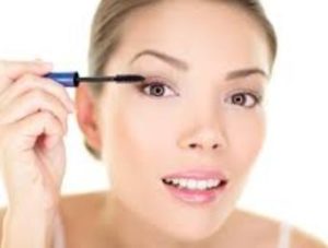 brushing makeup on